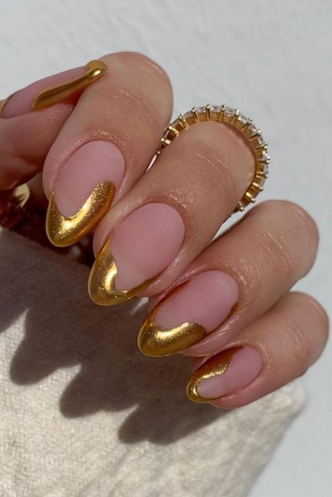 Deconstructed gold French manicure